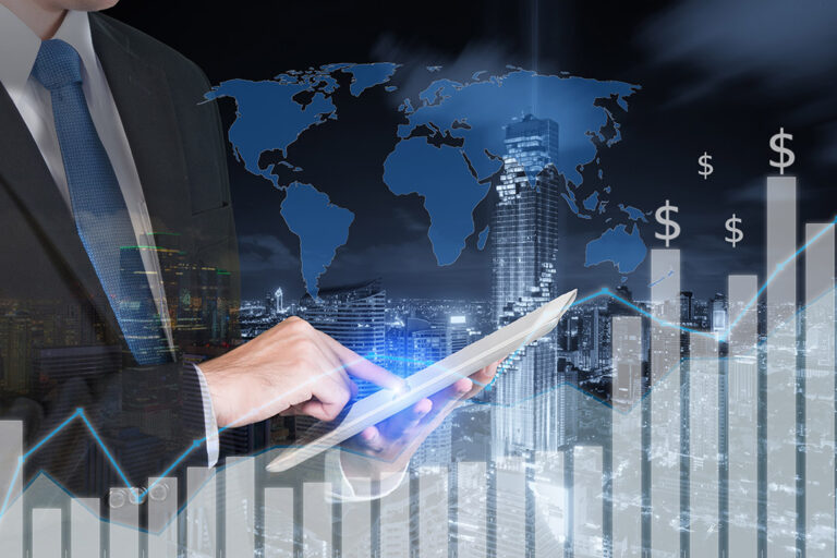 Double exposure of businessman using the tablet with city and fi